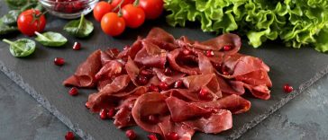 Sliced Prosciutto With Pomegranate Seeds